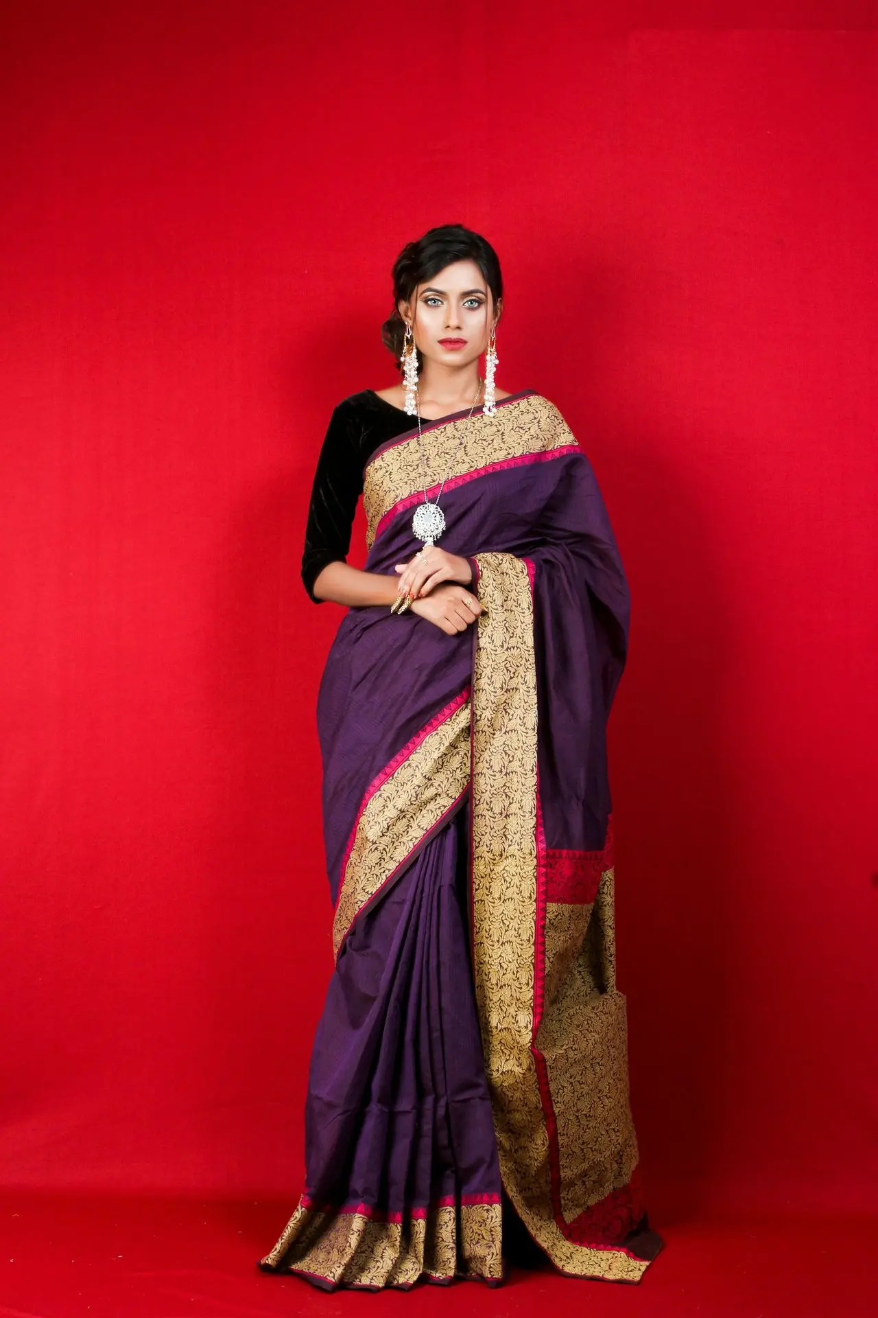 woman in red and brown sari